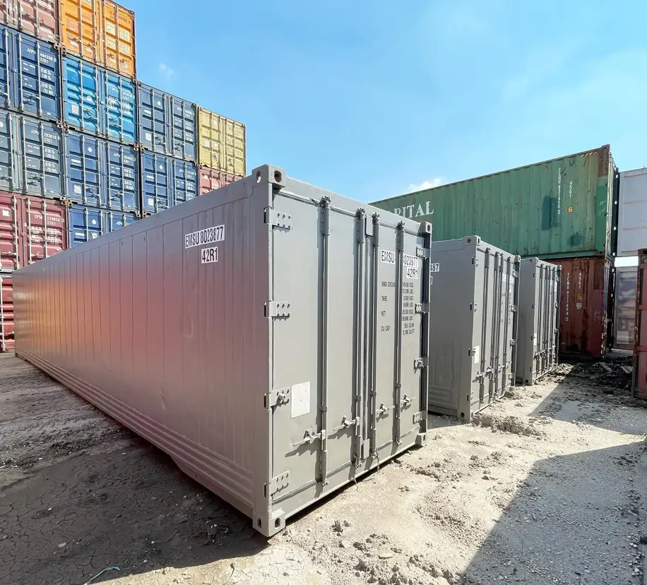 Grey 40ft shipping containers in a container yard